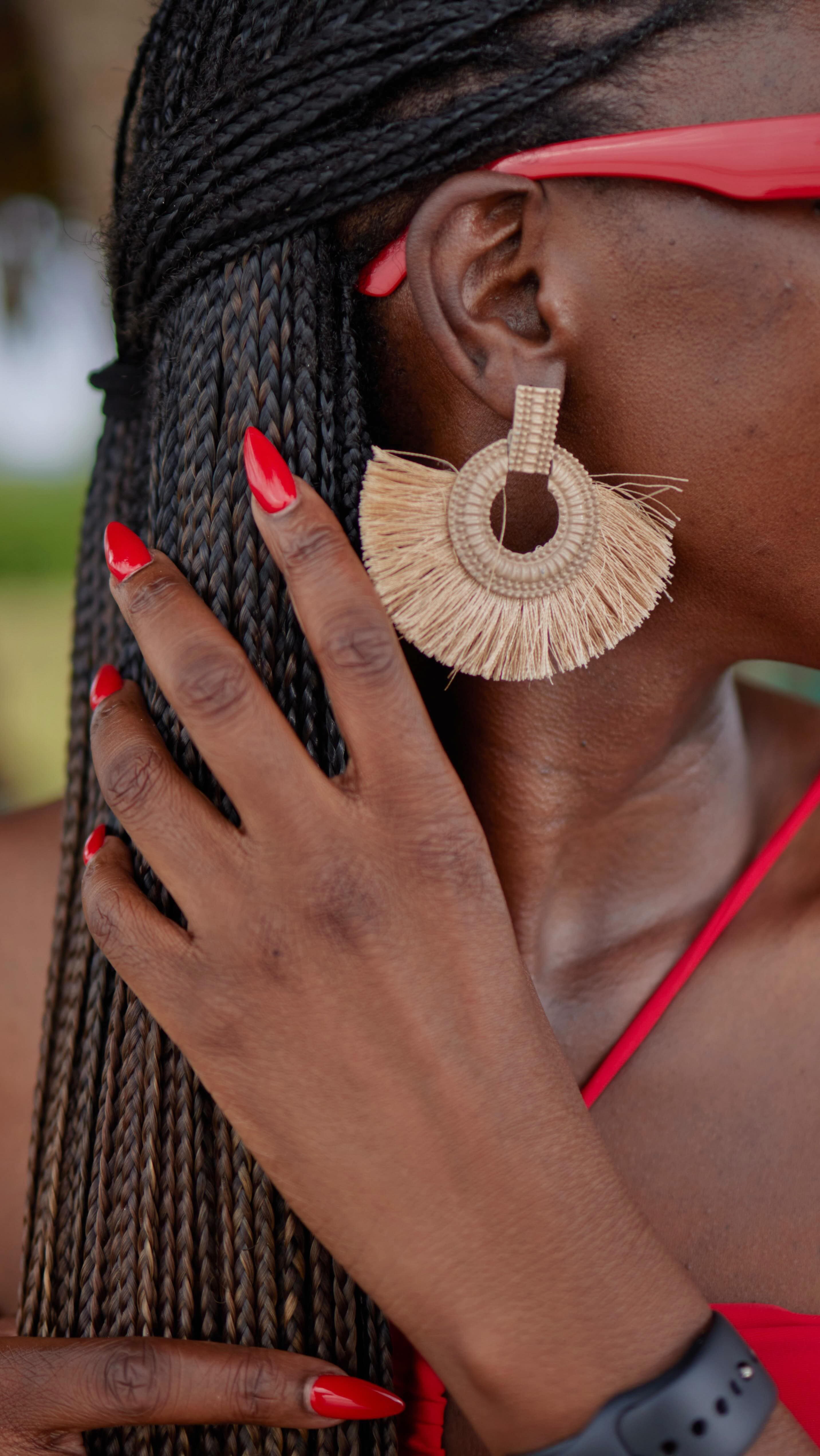 Close-up of raffia hoop earrings